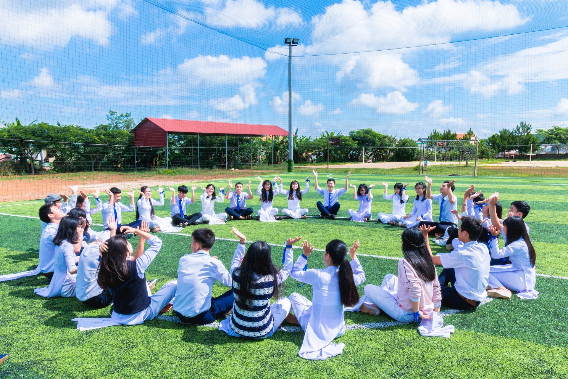 Students gathered outdoors for learning activities
